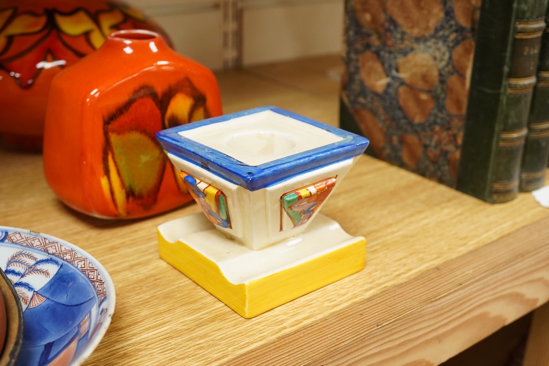 A group of mixed collectables including a Clarice Cliff Fantasque dwarf candlestick, silver mounted meerschaum pipe, etc.